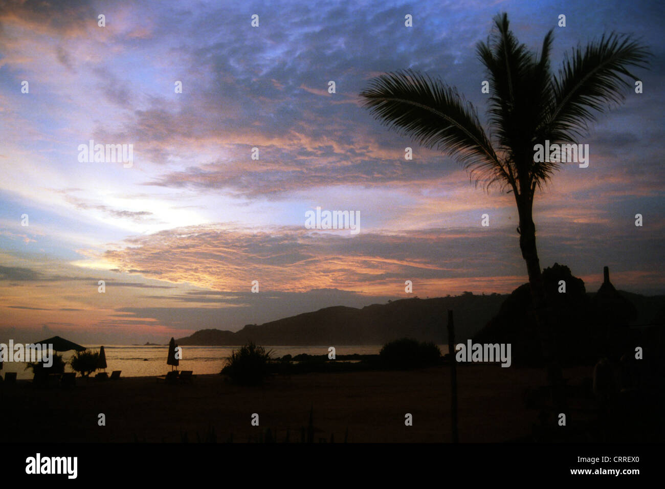 Sonnenuntergang am Strand Stockfoto