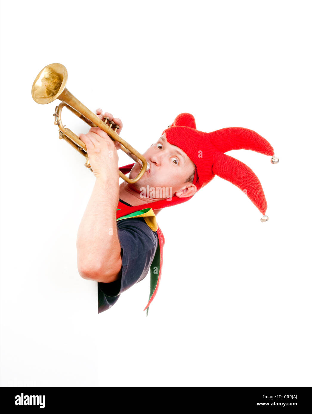 Jester - Figur in der typischen Tracht Trompete bläst unterhaltsam Stockfoto