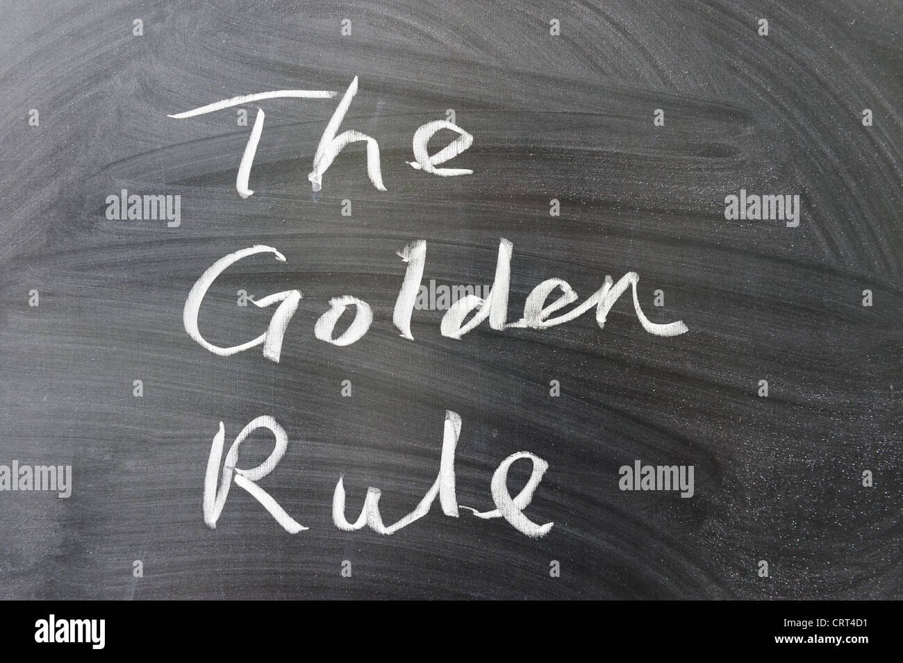 Die goldene Regel Wörter an die Tafel geschrieben Stockfoto