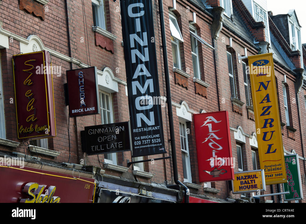 Brick Lane Restaurant Zeichen. London, England Stockfoto