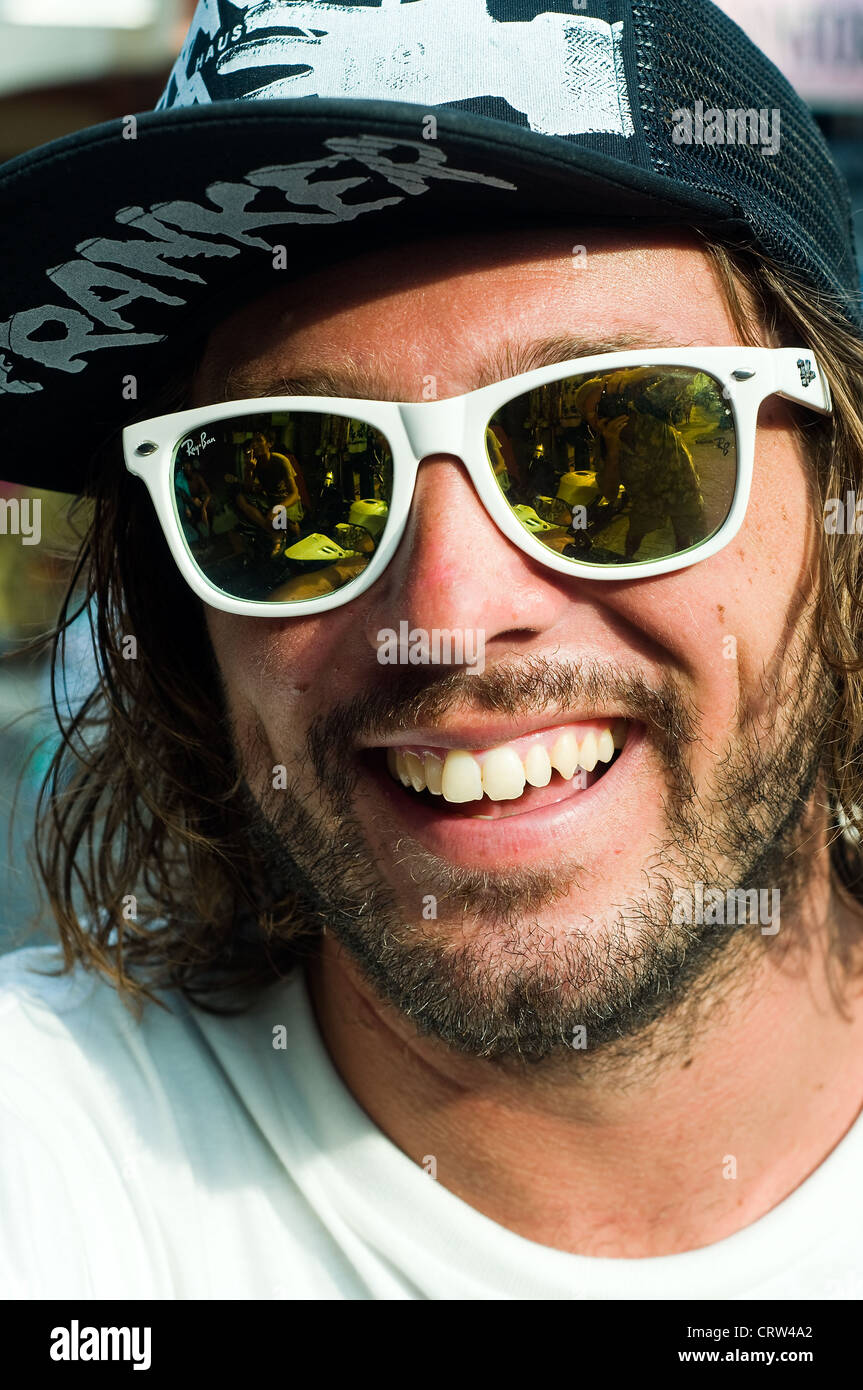 Mann in Poppies 1, Kuta, Bali, Indonesien Stockfoto