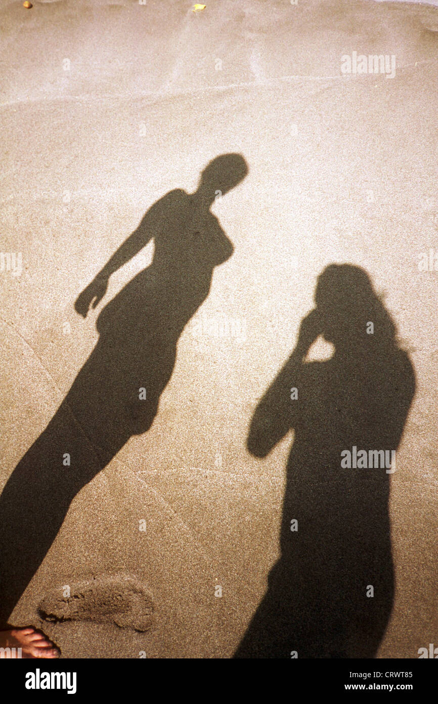 Schatten von ein paar am Strand Stockfoto