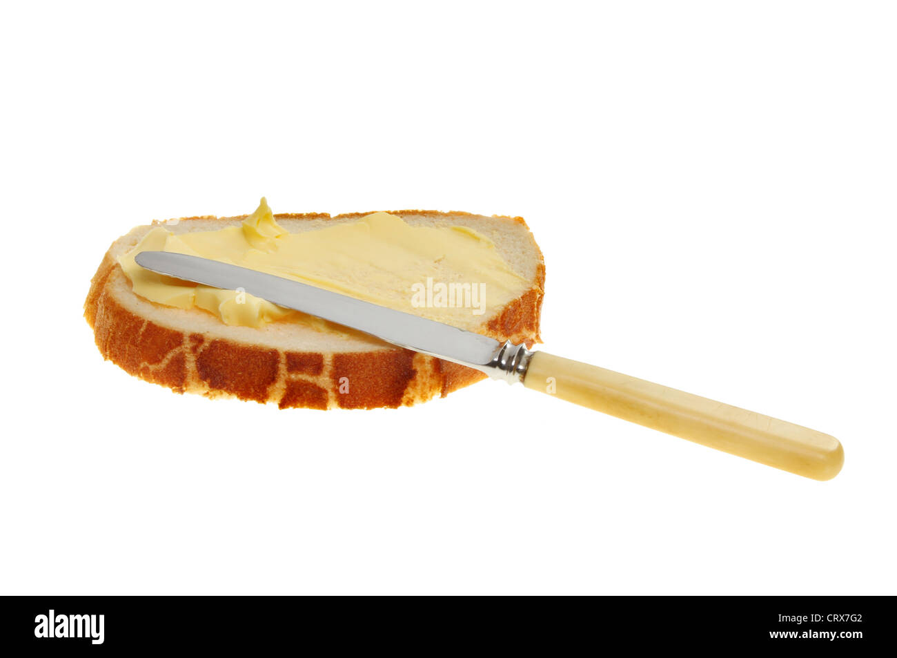Butterbrot mit einem Messer isoliert gegen weiß Stockfoto