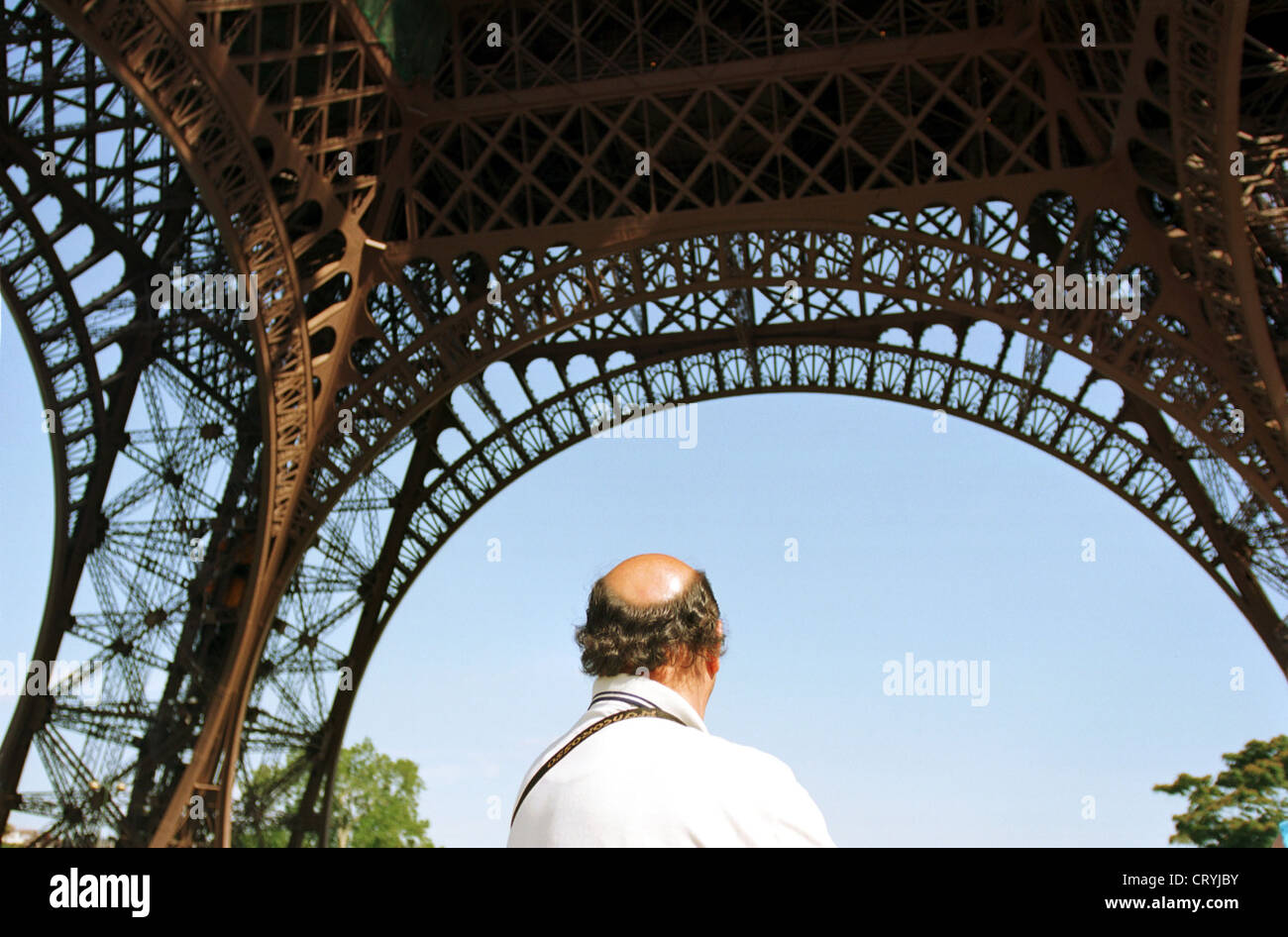 Glatze unter dem Eiffelturm Paris Tourismus Stockfoto