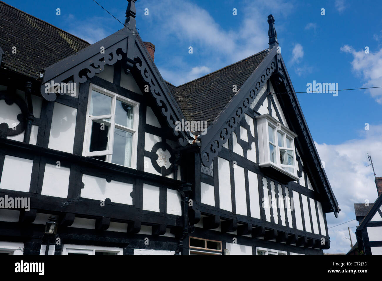 Traditionellen schwarzen und weißen Steinhaus typisch für Land Welsh Grenzgebiet Berriew Montgomeryshire Powys Mid Wales UK Stockfoto
