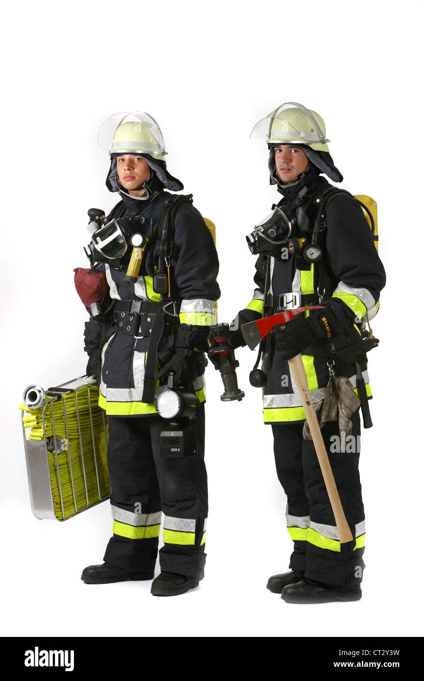 Feuer Sie Männer in schützende, feuerfesten Anzug mit Feuerlöscheinrichtungen. Feuerwehr, Feuerwehr. Stockfoto