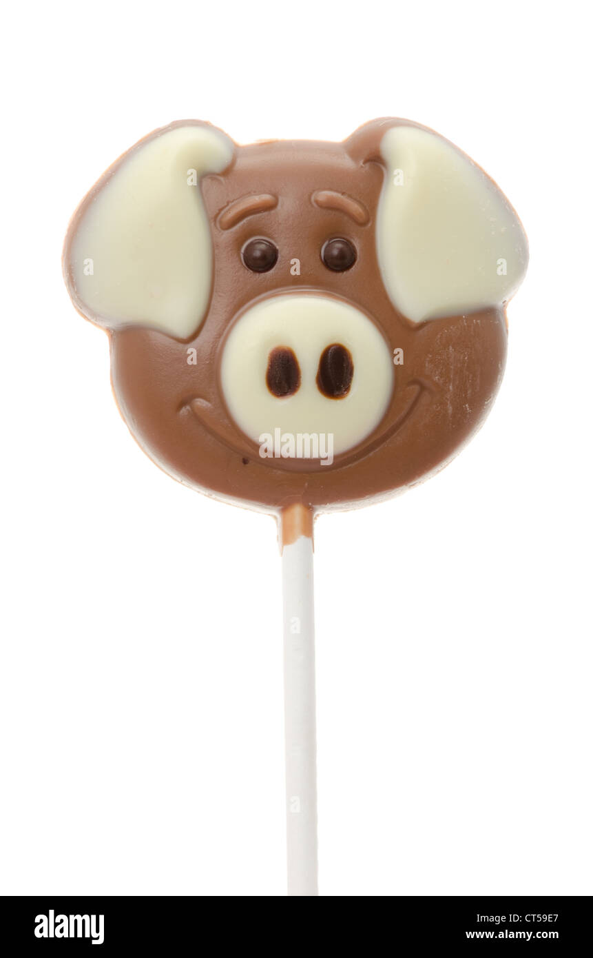 Ein freundliches Schwein Gesicht gemacht aus belgischen Milch und weißem Schokoladen - Schuss Studio mit weißem Hintergrund Stockfoto
