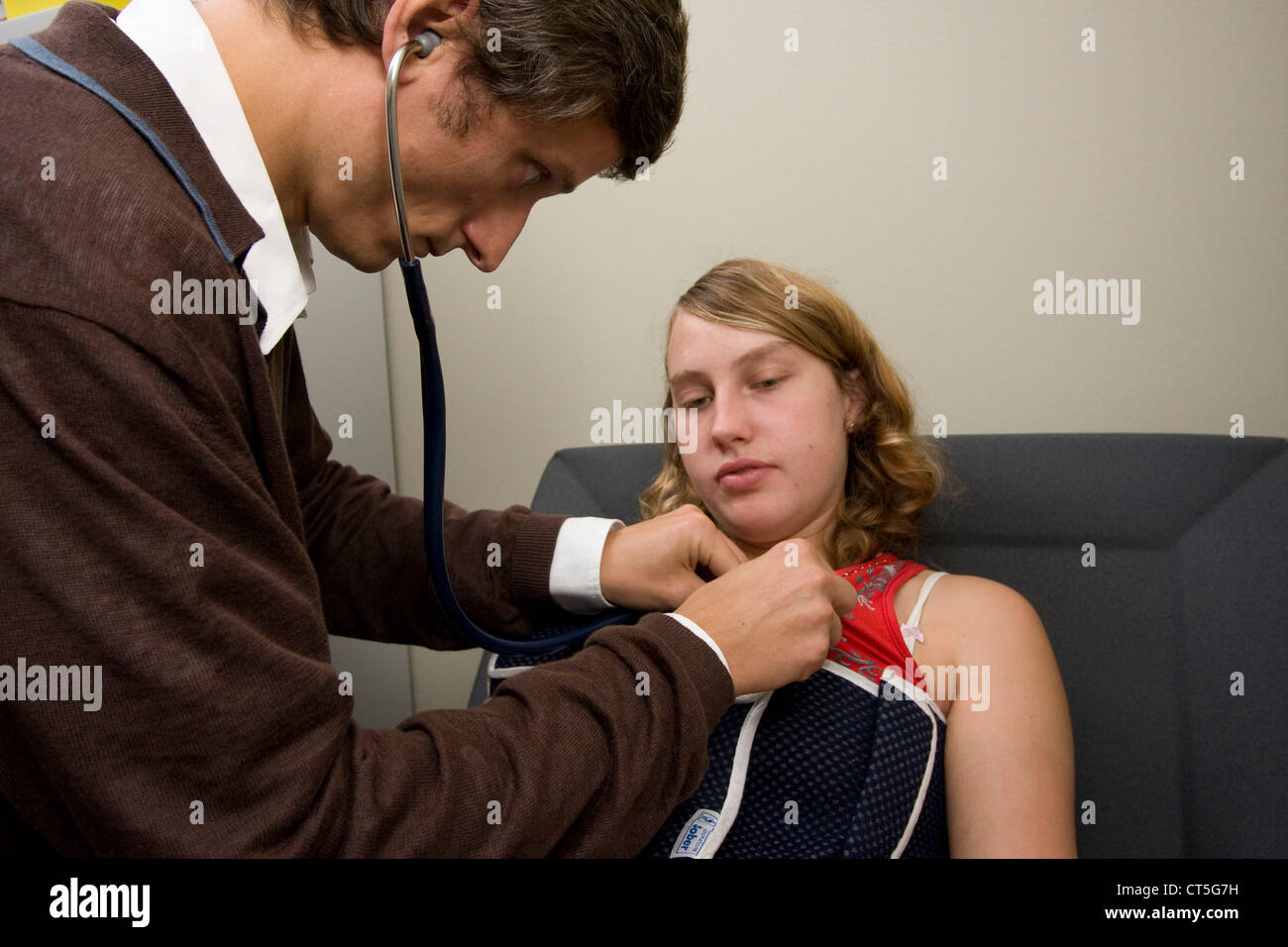 Female adolescent auscultation Fotos und Bildmaterial in hoher