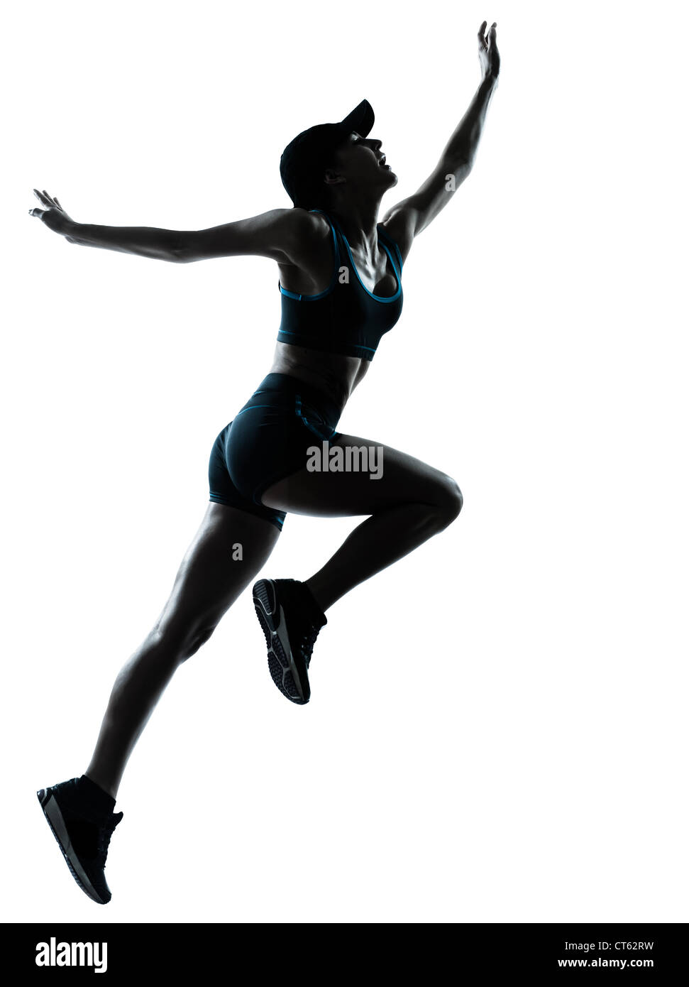 eine Kaukasische Frau Läufer Jogger springen im Silhouette Studio isoliert auf weißem Hintergrund Stockfoto