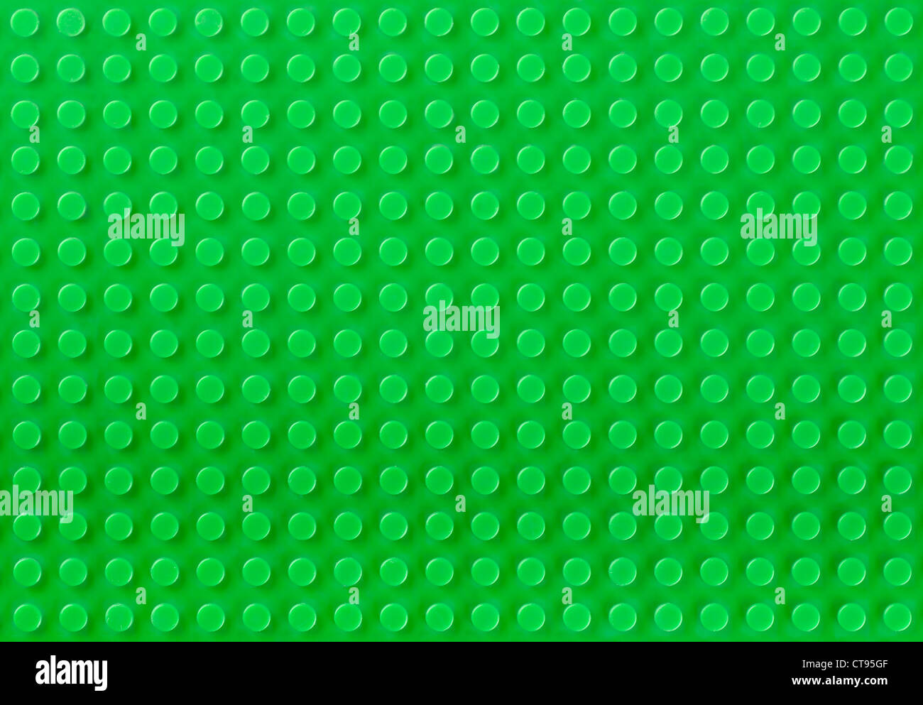 Grüne Kunststoff-Spielzeug-Konstruktor-Hintergrund Stockfoto