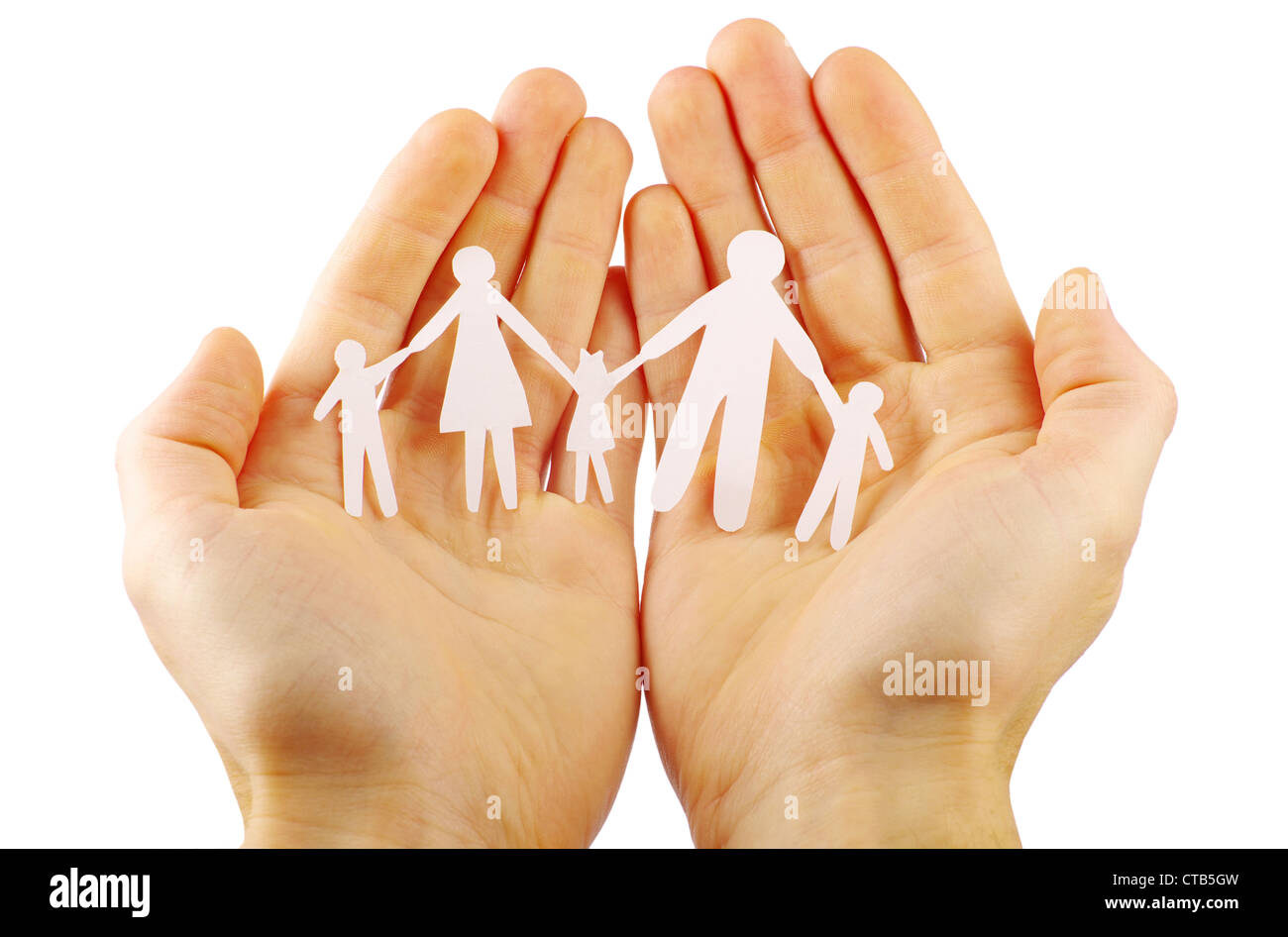 Papier-Familie in Händen Stockfoto