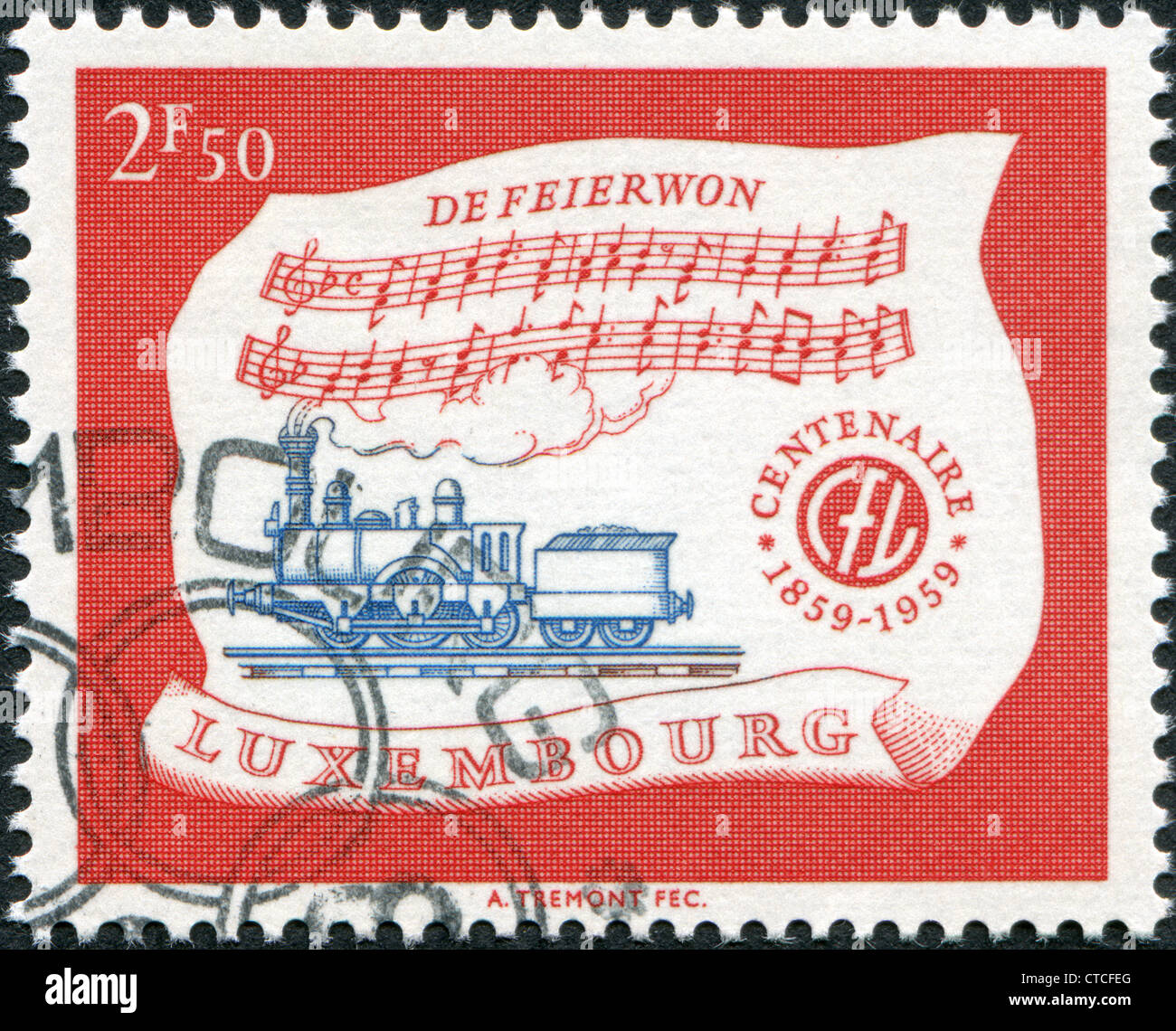 Eine Briefmarke gedruckt in Luxemburg, widmet sich der Hundertjahrfeier des luxemburgischen Eisenbahnen, zeigt Lok A1A n2 von 1859 und Hymne Stockfoto