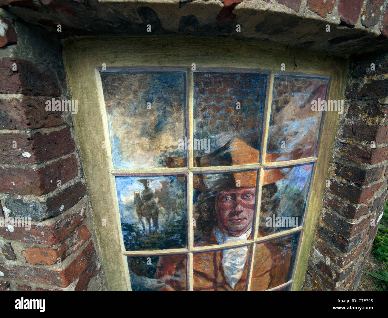 Ein Wandbild auf Ashcombe Toll House, in der Nähe von Kingston, Lewes, East Sussex, England. Stockfoto