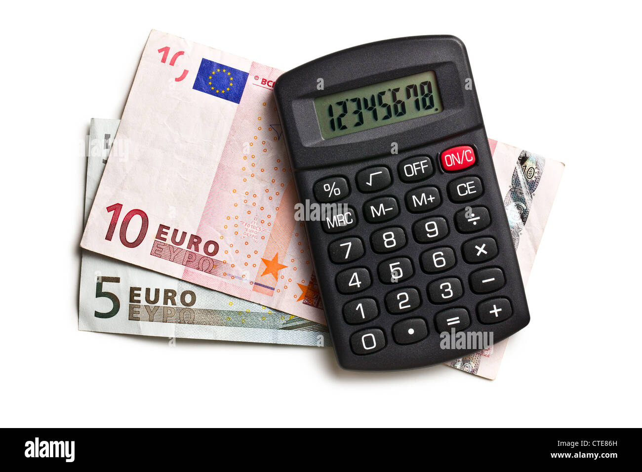 Rechner und Euro Währung auf weißem Hintergrund Stockfoto