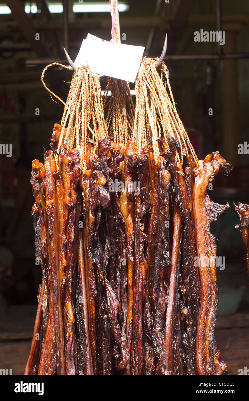 chinesische Trockenfleisch in Essen Aushärtung ist Foto in Penang, Malaysia übernommen. Stockfoto