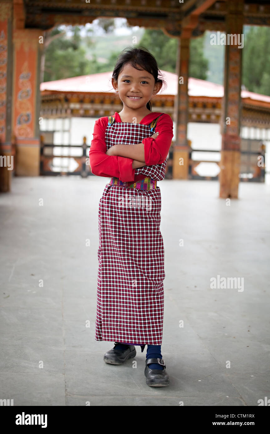 Bhutan Mädchen in traditioneller Kleidung, Lächeln Stockfoto