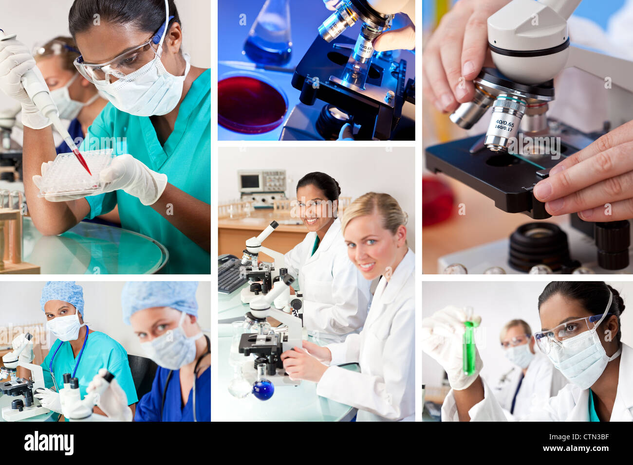 Zwei weibliche medizinische oder wissenschaftliche Forscher Mikroskopie arbeitet in einem Labor eine indische asiatische einem kaukasischen Stockfoto