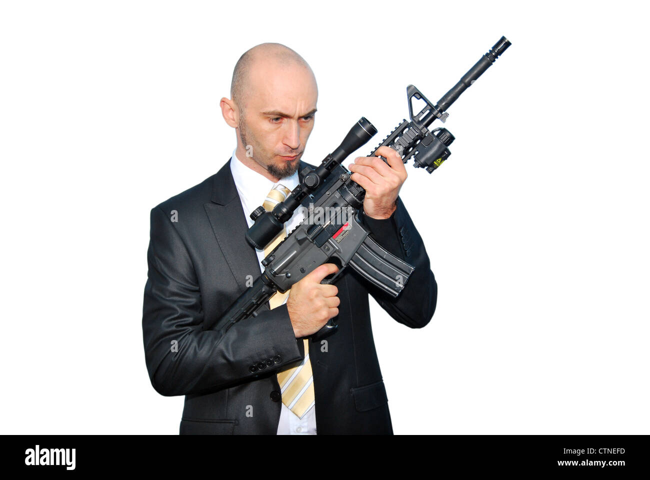 Geschäftsmann Leibwächter isoliert auf einem weißen Hintergrund mit einer Kanone Stockfoto