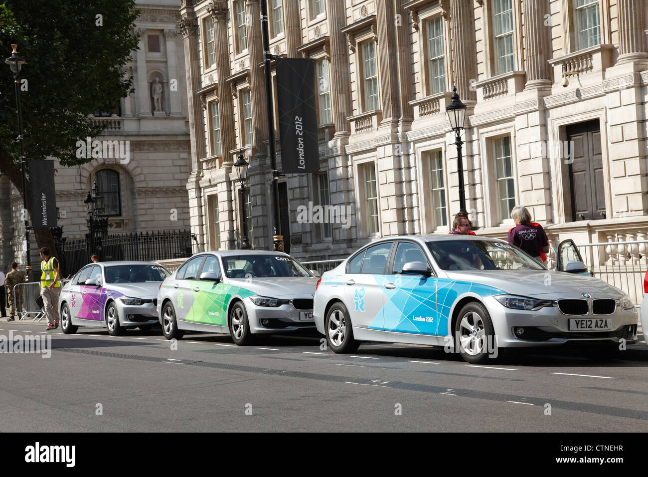 London 2012 Olympische BMW Dienstwagen auf Whitehall, Westminster, London, England, Vereinigtes Königreich Stockfoto