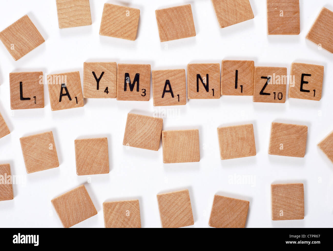 Ein neues Wörterbuch Wort: Laymanize, ausgeschrieben mit Holzfliesen Stockfoto