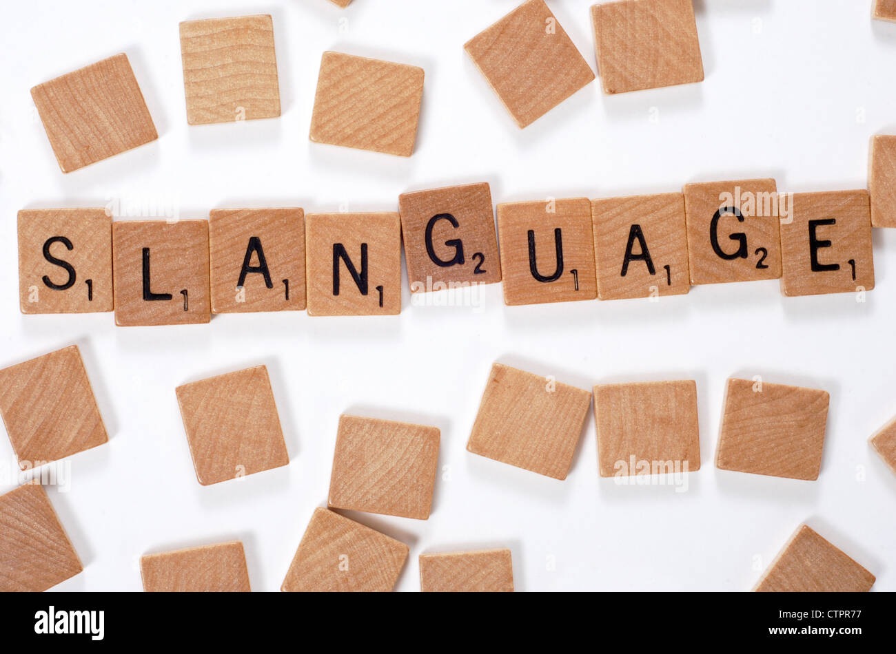 Neues Wort aus einem Wörterbuch: Slanguage, ausgeschrieben mit Holzfliesen Stockfoto