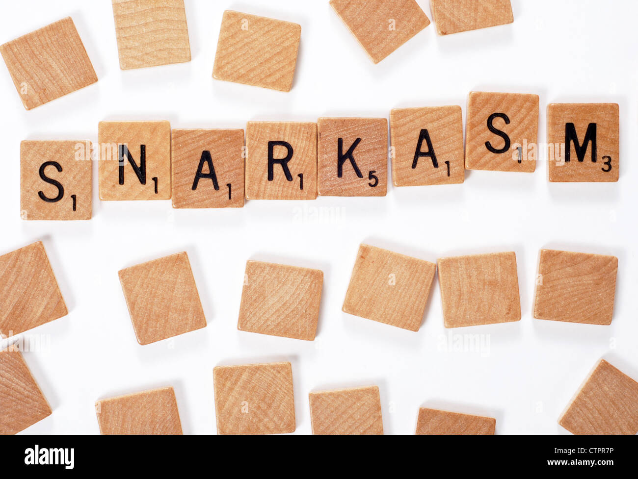 Ein neues Wörterbuch Wort: Snarkasm, ausgeschrieben mit Holzfliesen Stockfoto