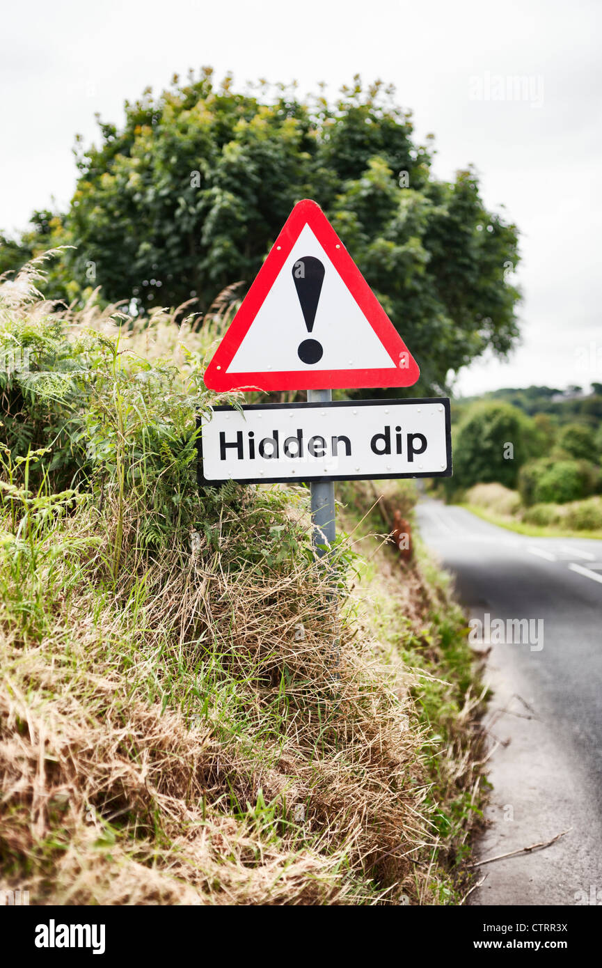 Hidden dip road sign -Fotos und -Bildmaterial in hoher Auflösung – Alamy