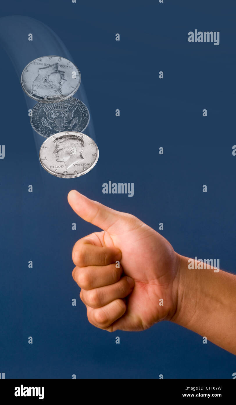 Eine silberne Kennedy Half Dollar Münze zu werfen. Stockfoto