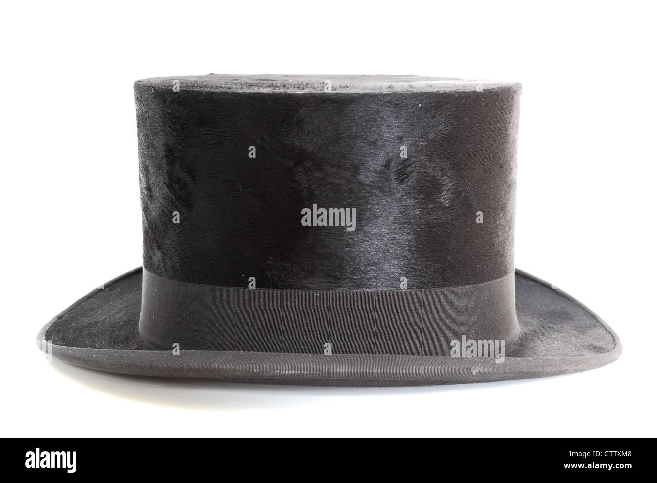 alte schwarze elegante Topper Hut auf weißem Hintergrund Stockfoto