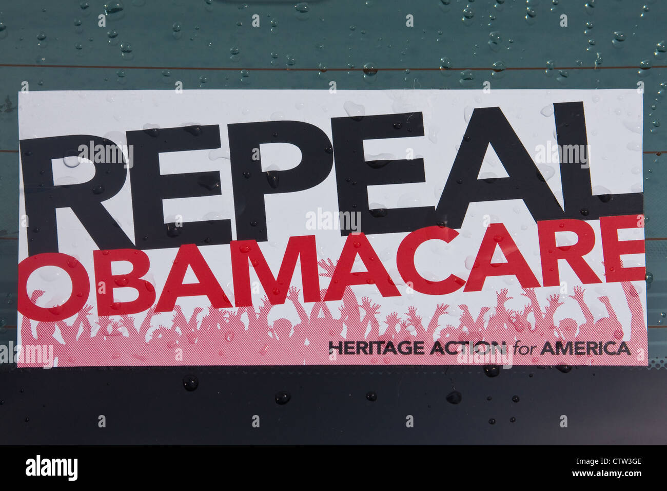 Barack Hussein Obama "Aufhebung OBAMACARE" politischen Aufkleber auf einem Auto Stoßstange. Stockfoto