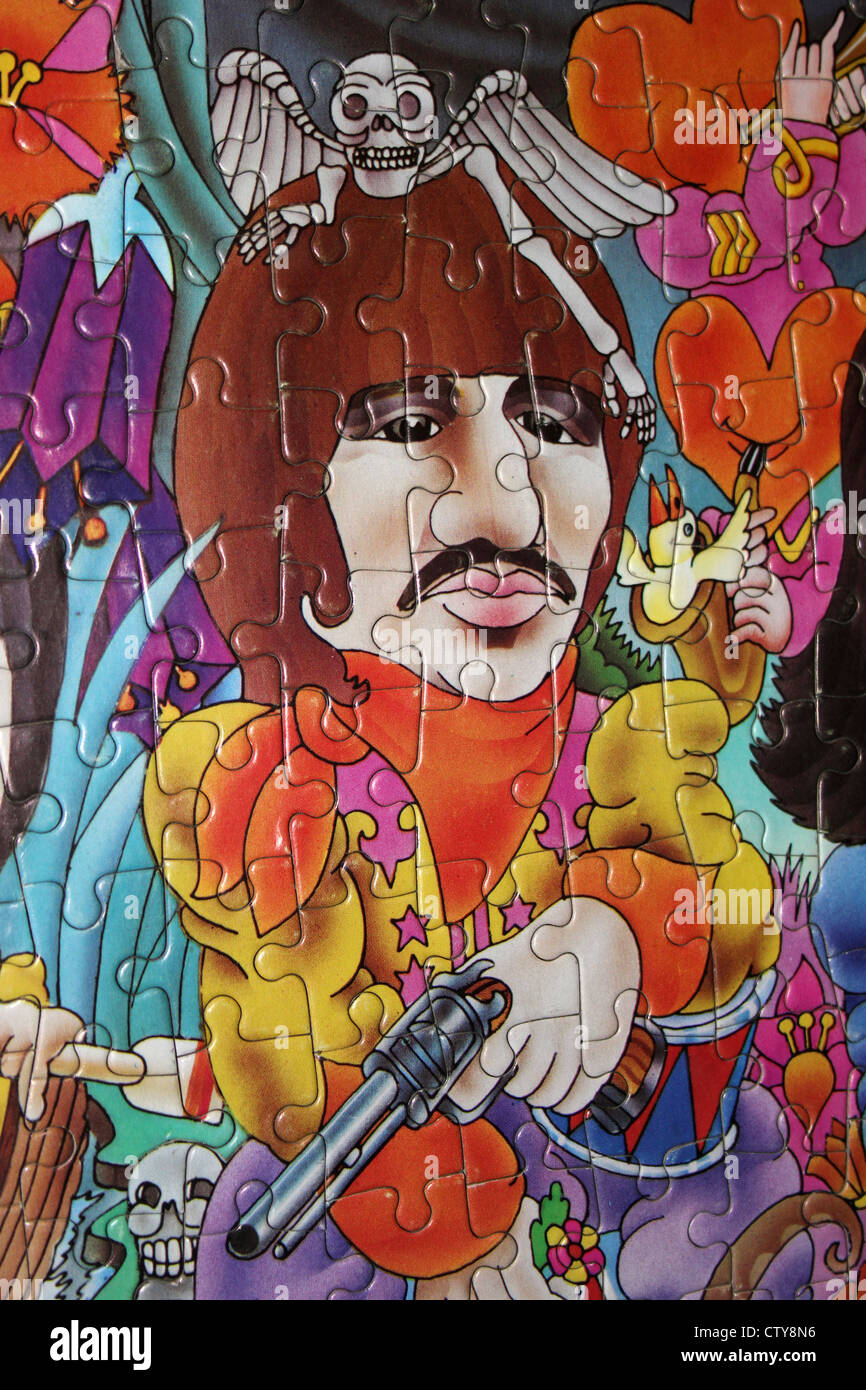 Beatles-Puzzle zeigt Ringo Starr mit Pistole Stockfoto