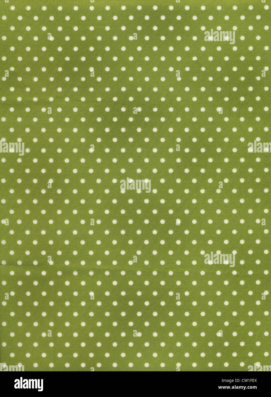 Grüner Stoff mit weißen Polka Dot Muster. Stockfoto