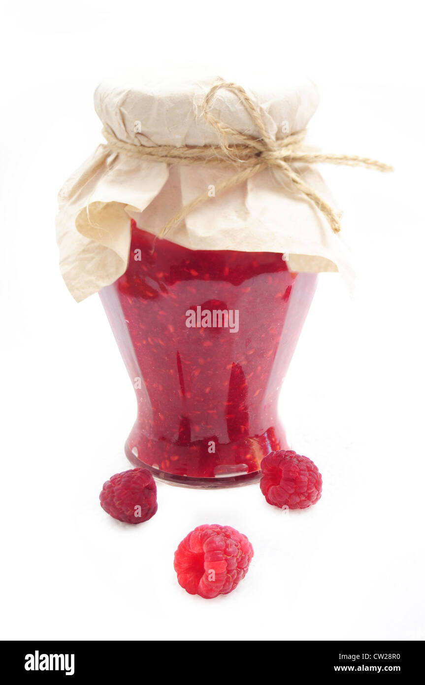 Glas mit Himbeermarmelade und frisches Obst Stockfoto