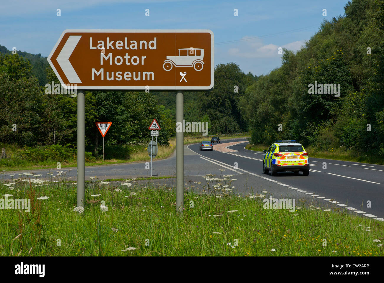 Melden Sie sich an die A590, Regie Autofahrer Lakeland Motor Museum, bei Backbarrow, South Lakeland, Cumbria, England UK Stockfoto