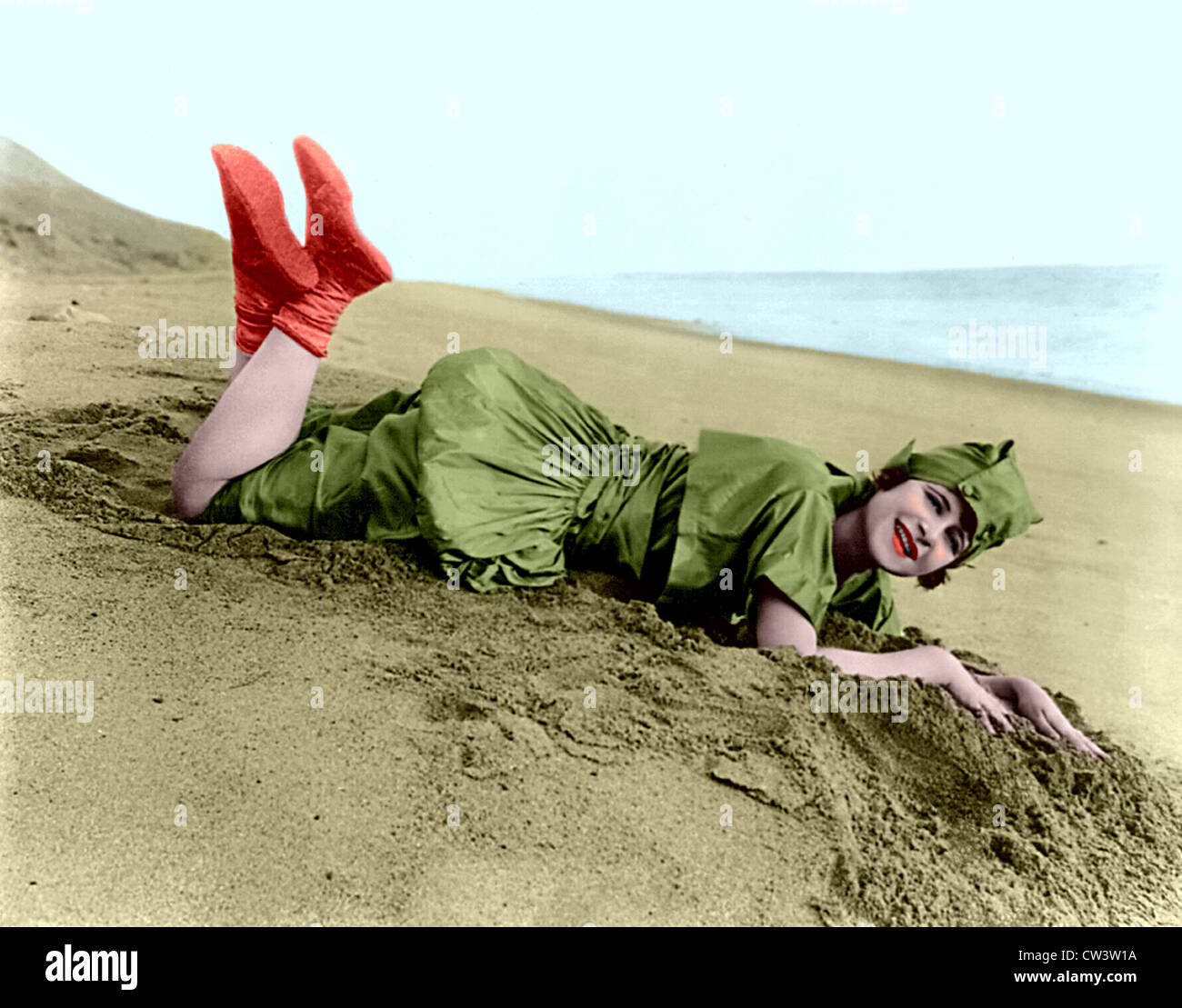 Frau im sand Stockfoto
