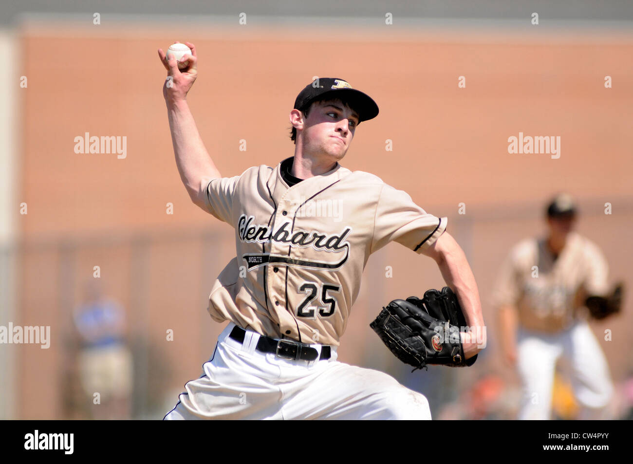 Baseball Pitcher liefert einen Kreis ändern, um eine gegnerische hitter. USA. Stockfoto