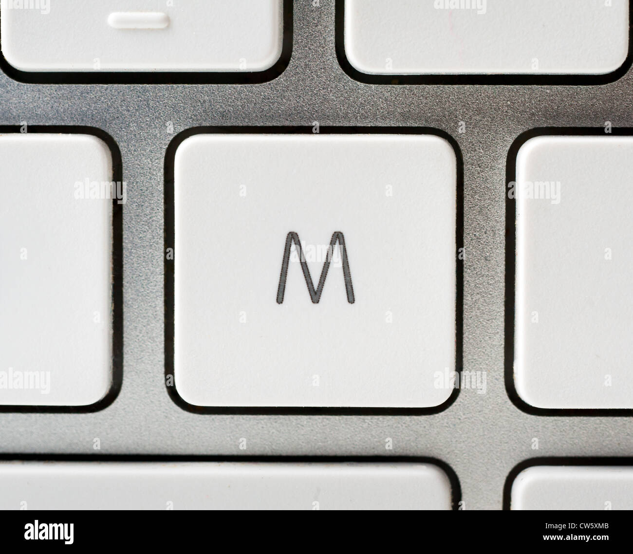 Buchstabe M auf einer Apple-Tastatur Stockfoto
