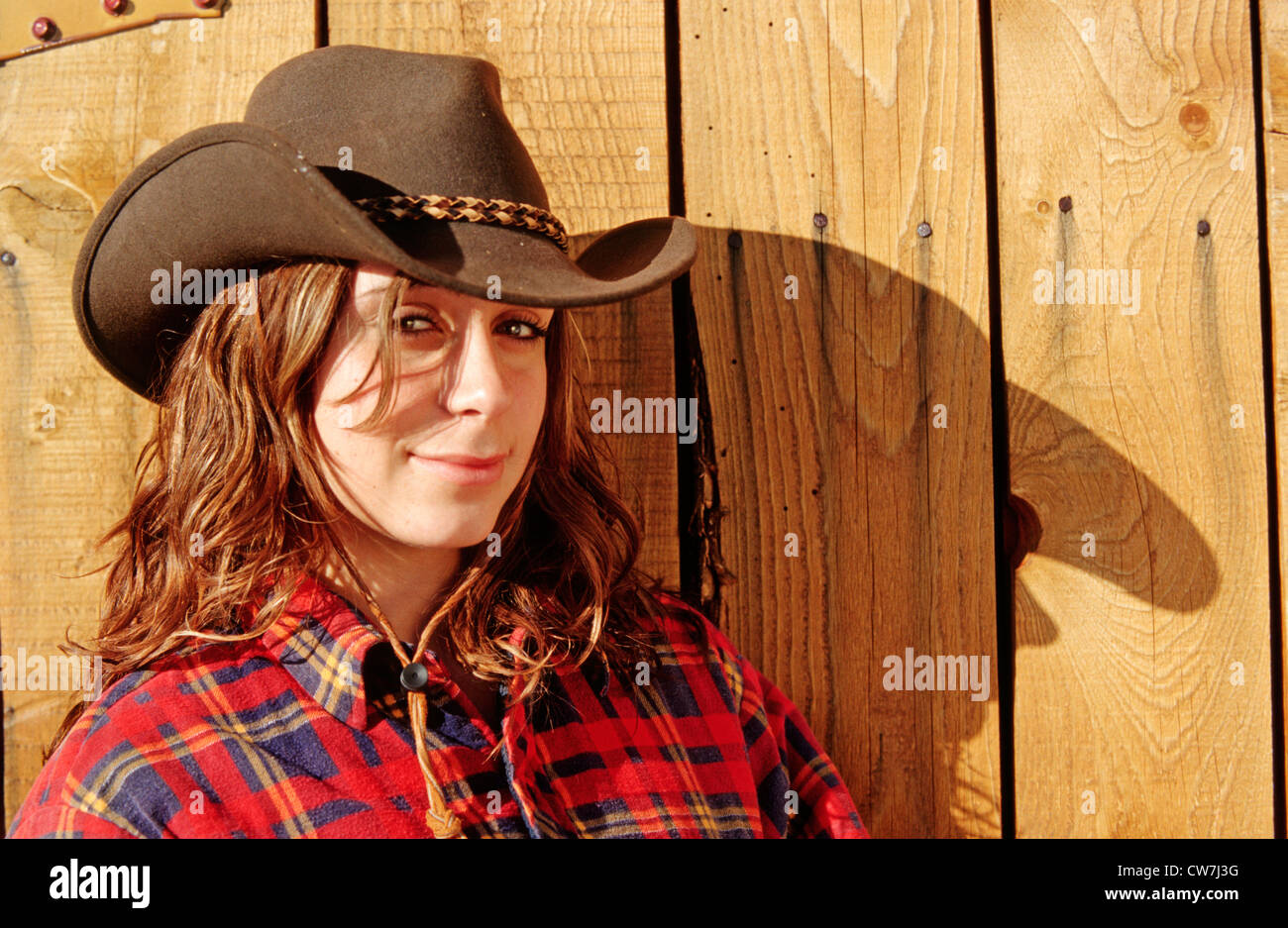 Porträt eines Cowgirl mit Schatten, Kanada Stockfoto