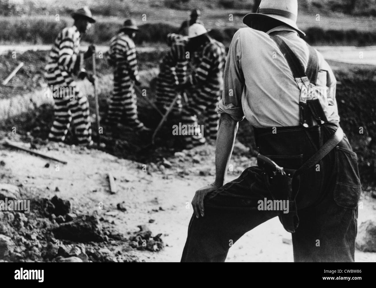 Sträfling Sträflingskolonne und Gefängnis bewachen in Oglethorpe County, Georgia, Mai 1941. Stockfoto