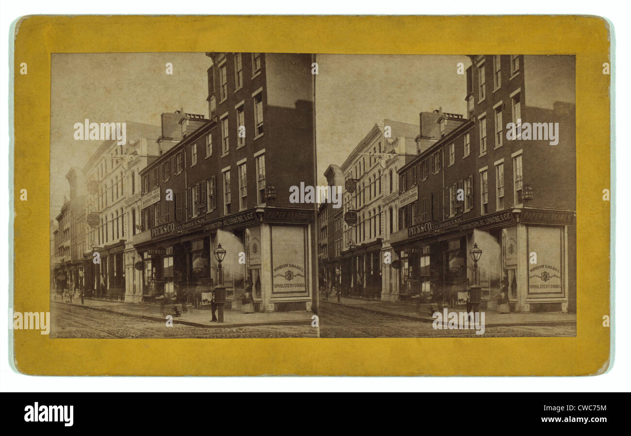Philadelphia im Jahre 1870. Kastanien Straße unten 11th Street auf der Südseite. Geschäfte verkaufen Konsumgüter und Kleidung. Fußgänger Stockfoto