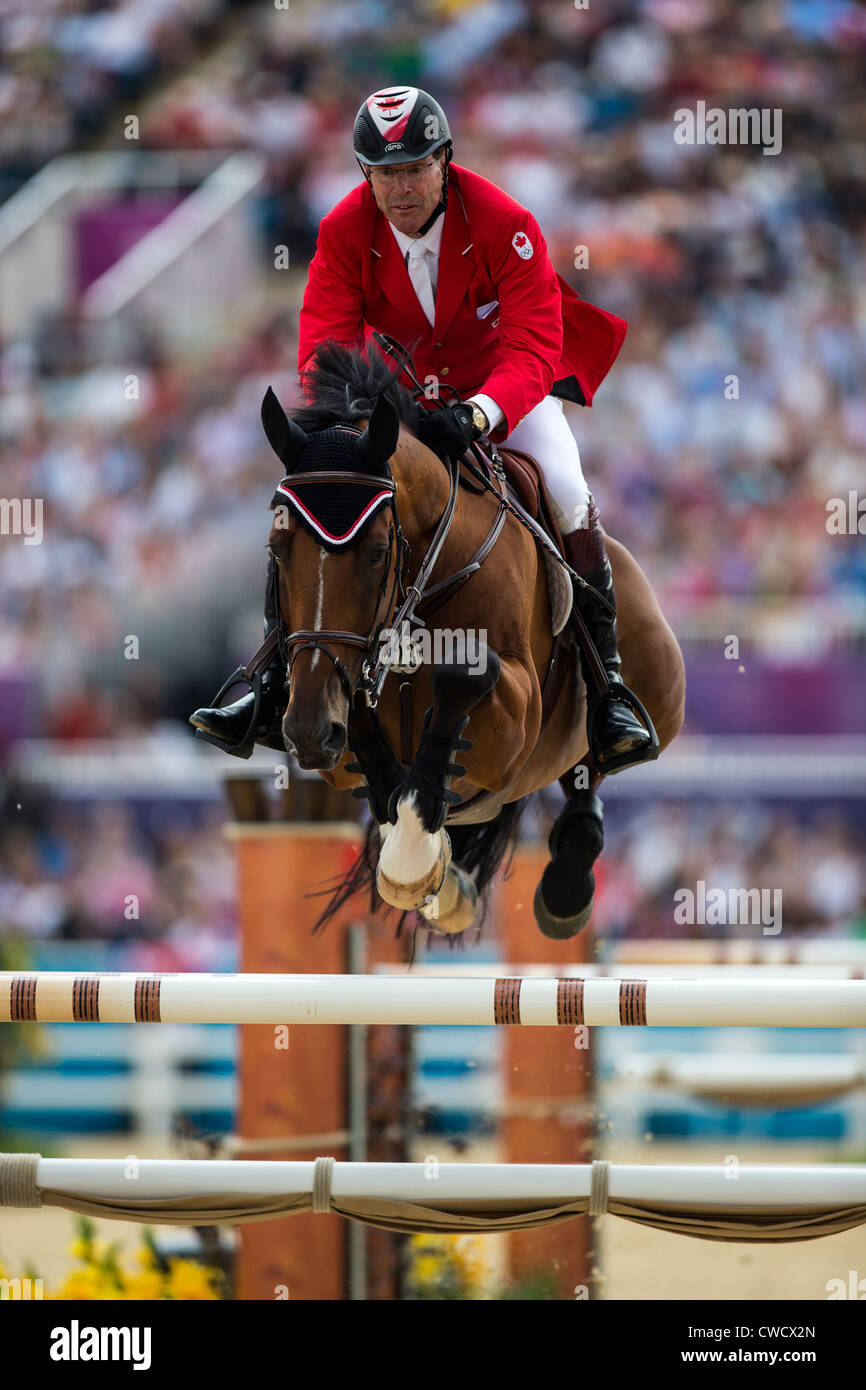 Ian Millar (CAN) Reiten STAR POWER in die einzelnen Sprung Pferdesport-Event bei den Olympischen Sommerspielen 2012 in London Stockfoto