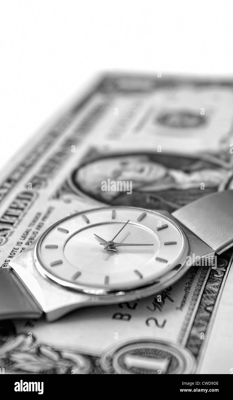 Uhr und Dollar, Zeit und Geld-Konzept Stockfoto