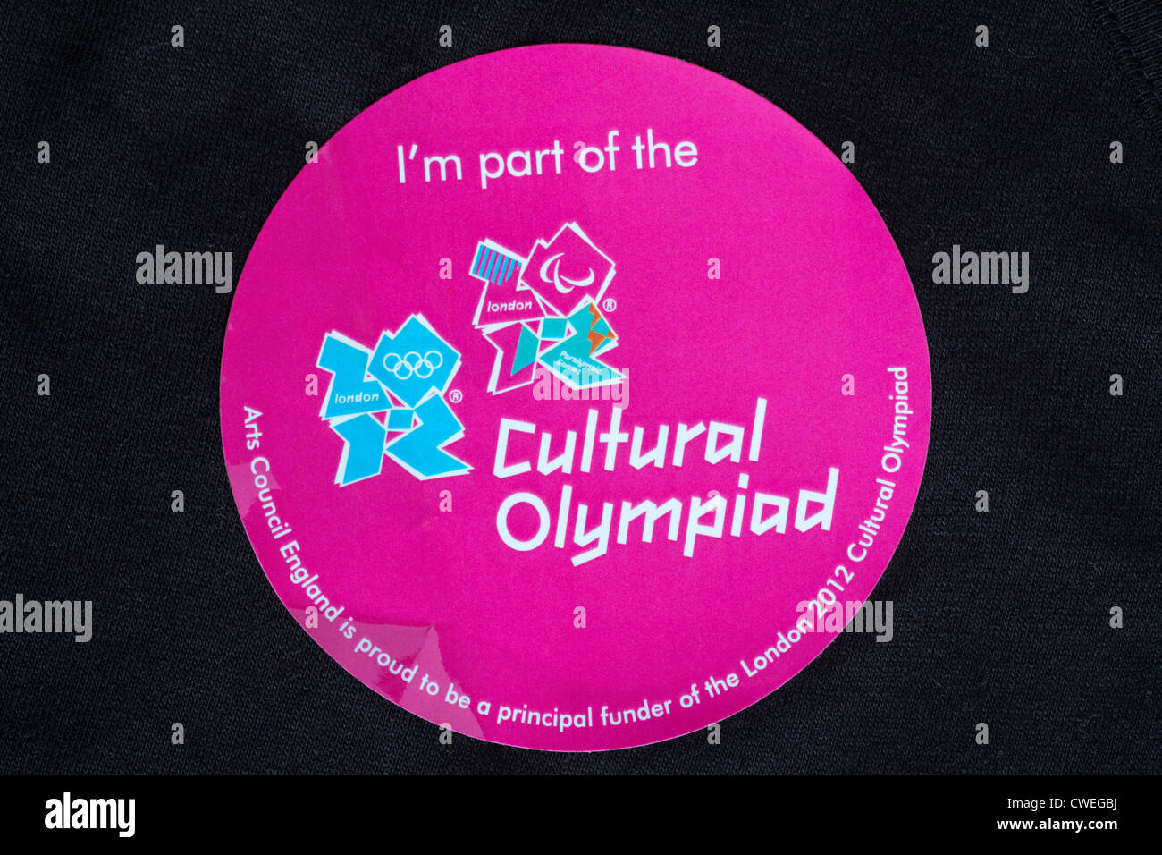 Ich bin ein Teil der Kultur-Olympiade Sticker aufgeklebt schwarzes top Stockfoto