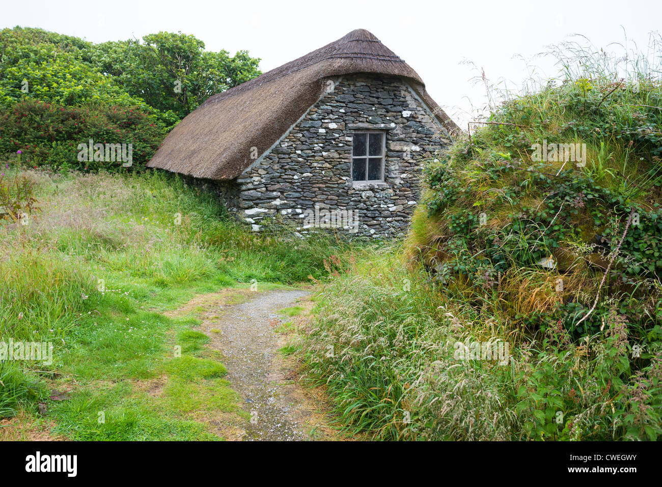 19. Jahrhundert strohgedeckten Hungersnot Cottages, Fahan, Halbinsel Dingle, County Kerry in Irland. Stockfoto