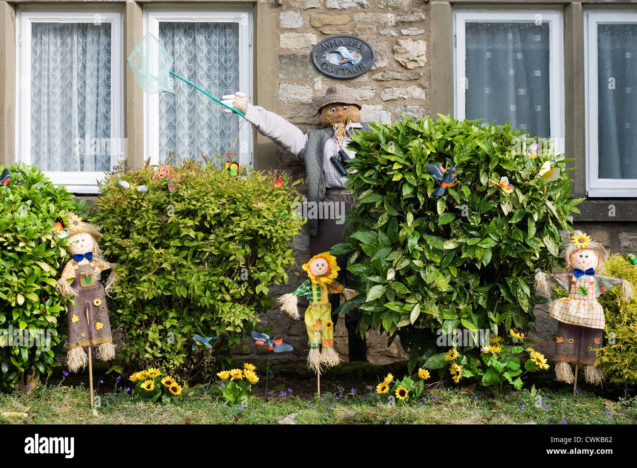 Vogelscheuche Kettlewell Festival Darstellung Mann mit Fernglas und Schmetterlingsnetz Stockfoto