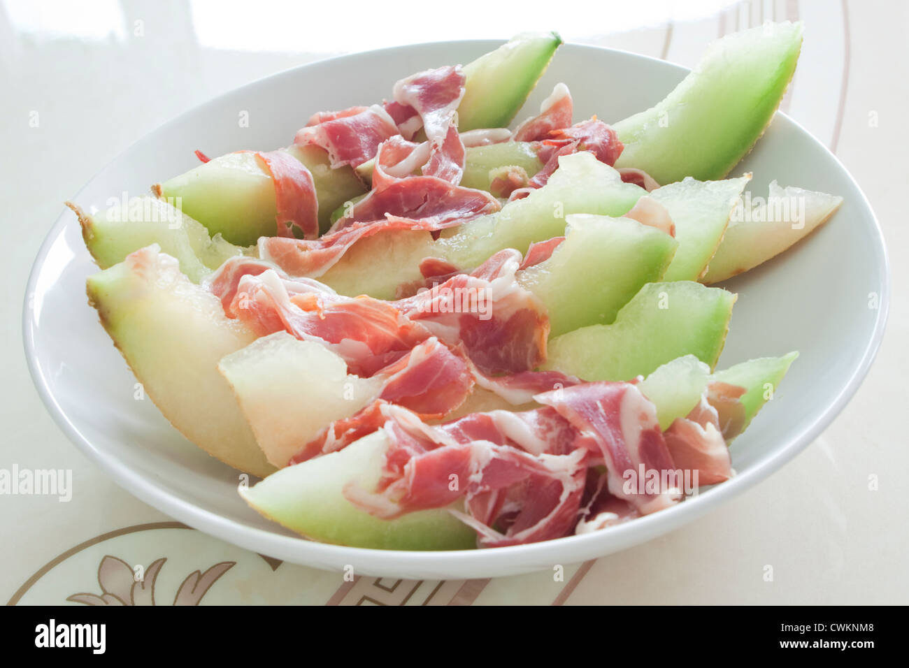 Honigmelone mit Parmaschinken Stockfoto