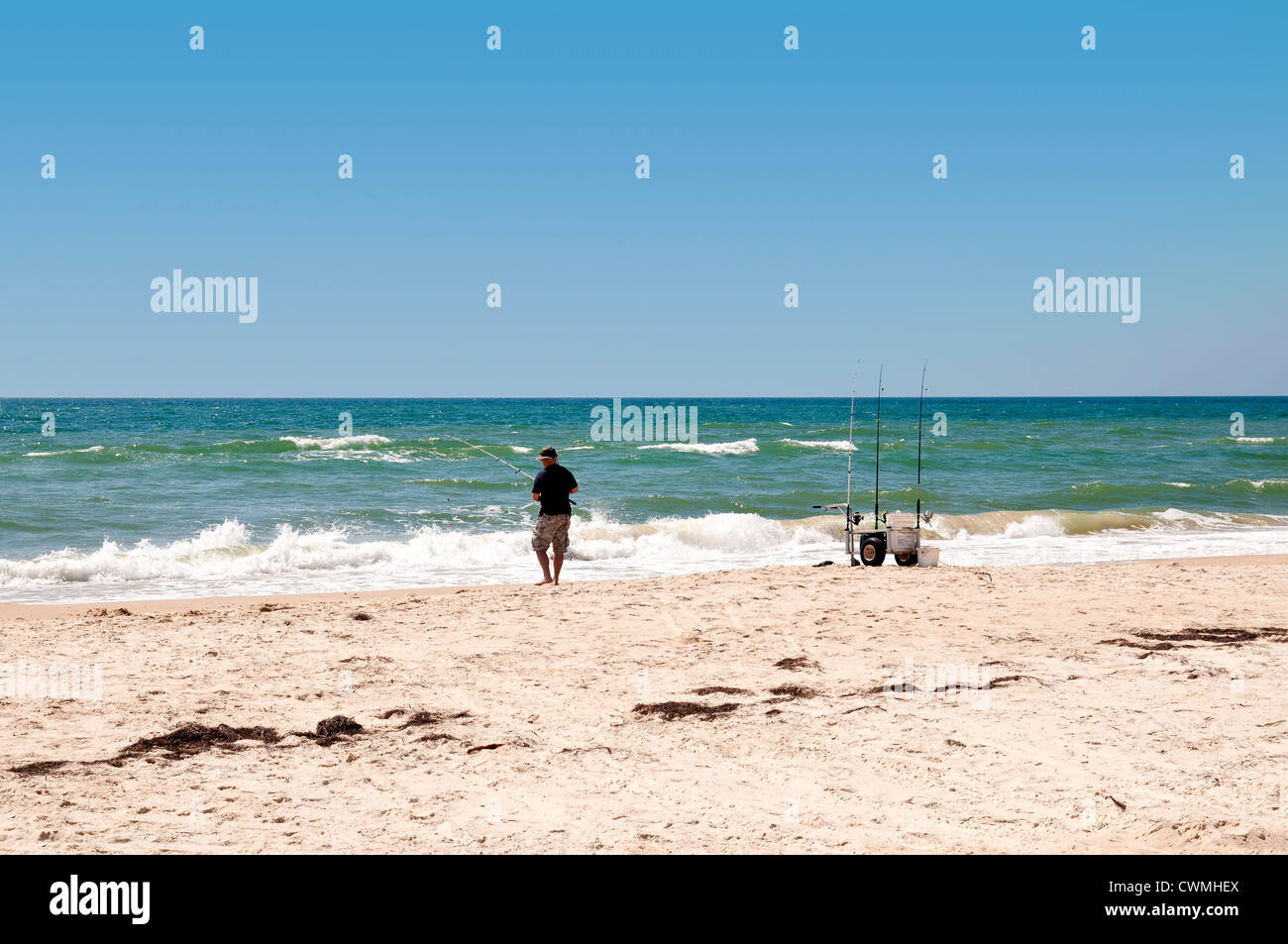 St. George Island, Florida, U.S,A. - 28. März 2012: Surf Fischer Fischerei vor St. George Island, Florida, 28. März 2012. Stockfoto