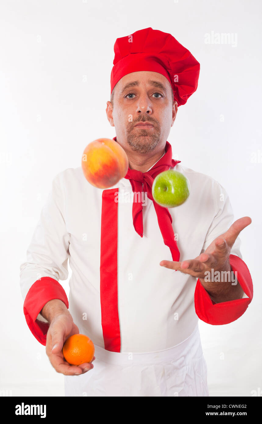 Männlichen Chef jonglieren Obst Stockfoto