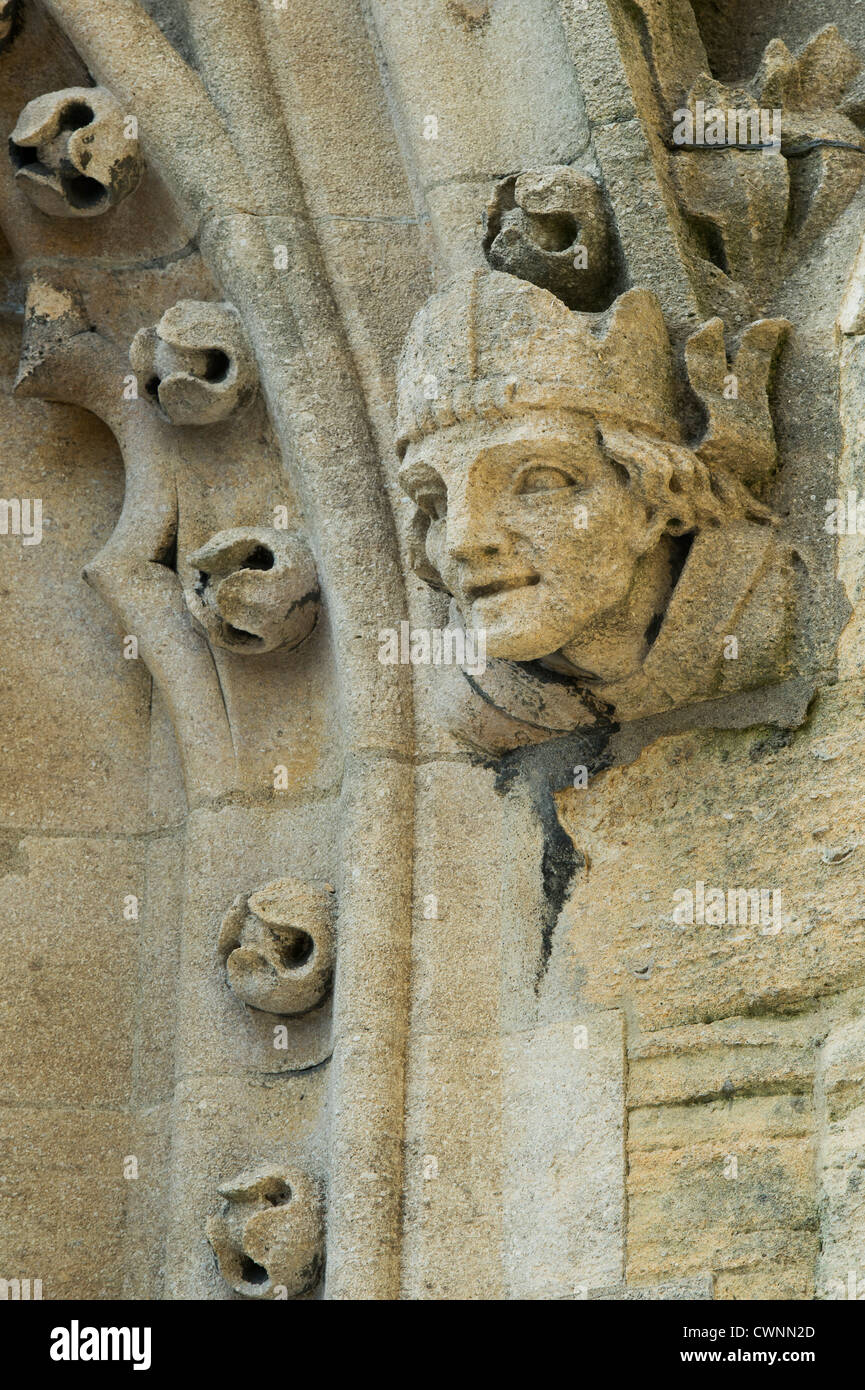 Steinerne mans Kopf auf dem Turm von der Universität Kirche von Str. Mary die Jungfrau Oxford, England Stockfoto