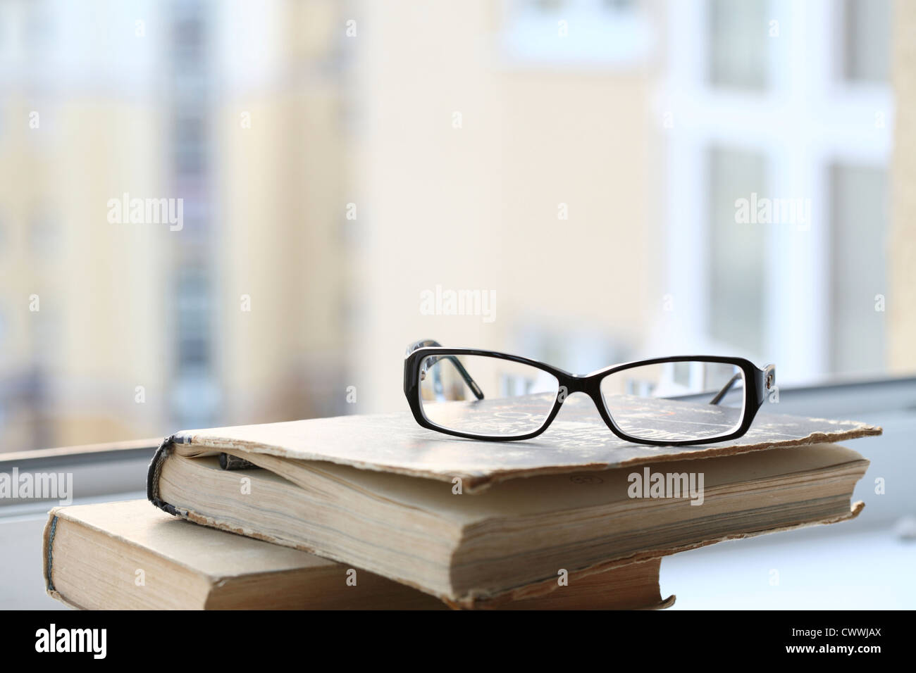 alte Bücher und die Gläser Stockfoto
